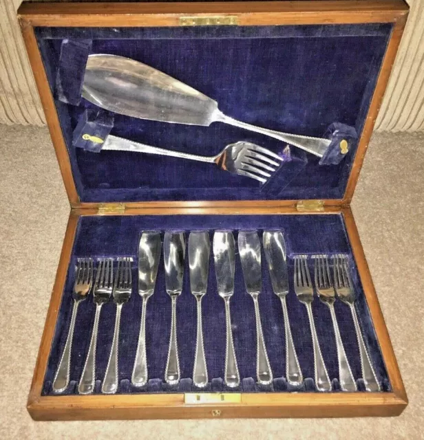 A superb vintage cased set of fish eaters, servers. knives & forks EPNS 14 piece