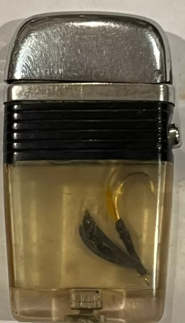 Scripto vintage Vu-Lighter with fish hook lure circa 1960's Black & Clear