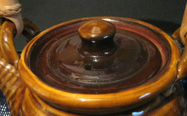 Fabulous teapot with a wonderful wooden/bamboo handle in brown unmarked 2