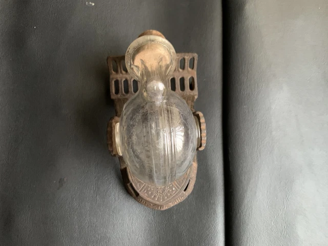 Tipper Inkwell Bottle on Cast Iron Base.