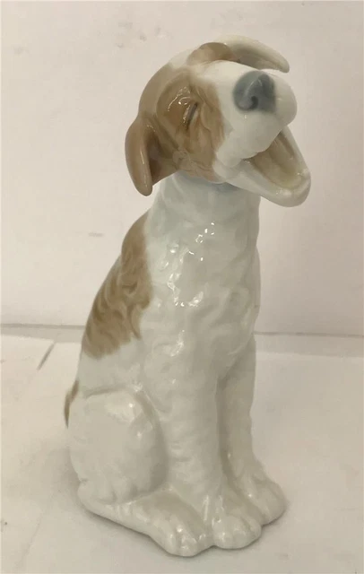 Lladro Nao Yawning Airedale Terrier Dog Figure 6 1/2" Tall Lladro Nao Yawning Airedale Terrier Dog Figure 6 1/2" Tall