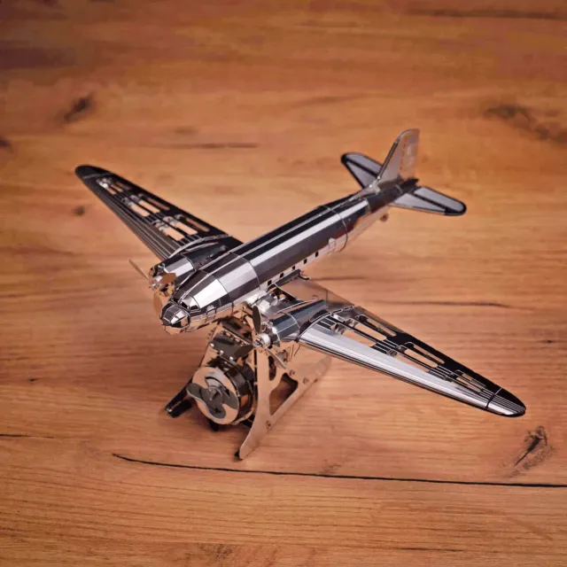 A metal model of a DC-3 named "Remarkable Douglas"
