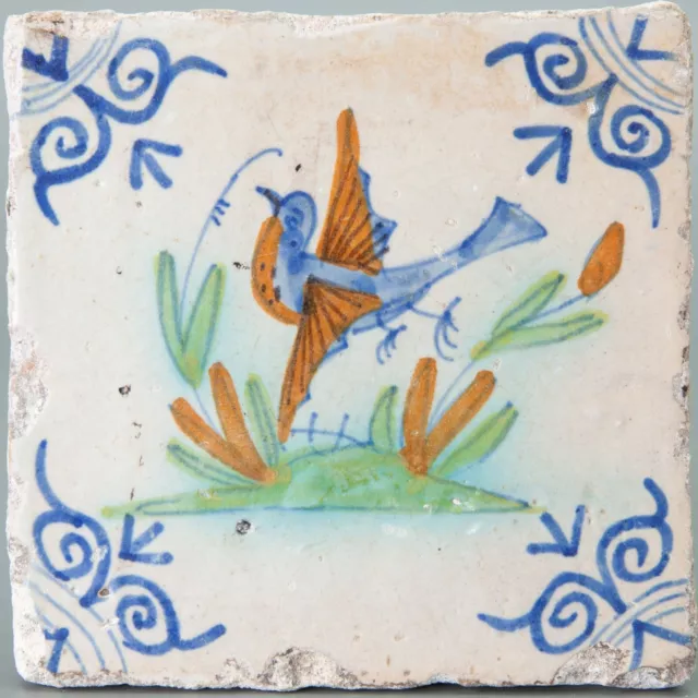 Nice Dutch Delft polychrome tile, bird, mid 17th. century.