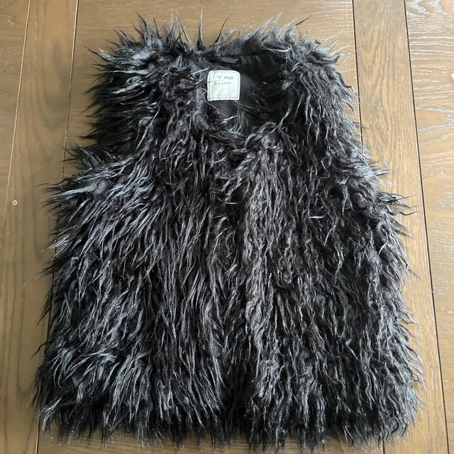 Scaldacorpo in pelliccia sintetica nero intelligente/gilet. Successivo, età 14. Ecc C