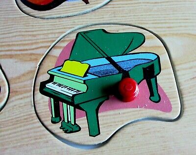 Wooden Peg Puzzle, Musical Instruments. Piano, guitar, tambourine and more. 3