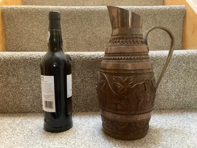 Old Oak and Brass wine pitcher jug hand carved with grapes