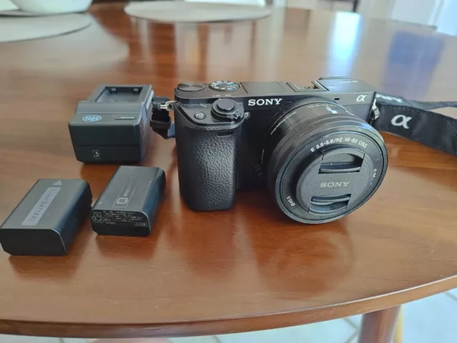 Sony Alpha a6000 Mirrorless Camera w/ 16-50mm Retractable Lens & Spare Batteries