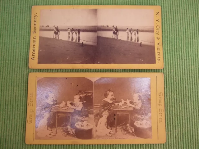 Lot of 2 Stereoscope Stereoview Cards American Scenery N. Y. City Beach Dolls