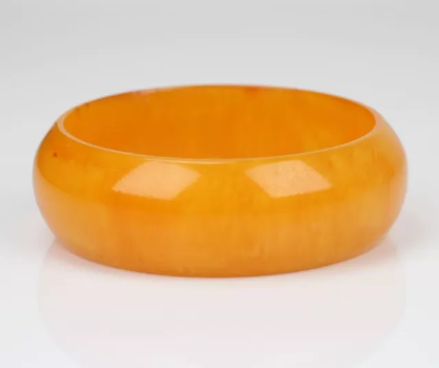 Vintage Bakelite semi-translucent amber orange bracelet. 2