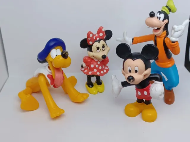4 Disney Figures Mickey, Minnie, Goofy, And Pluto 2
