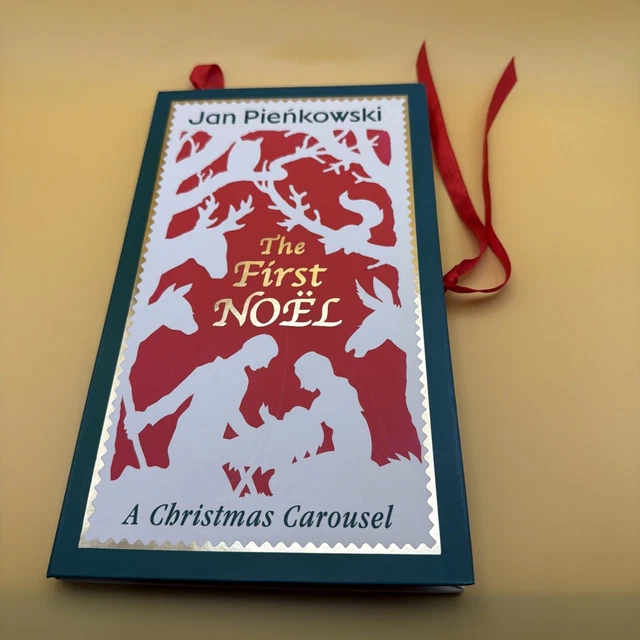 JAN PIENKOWSKI THE First Noel Hardback Christmas Carousel Decor