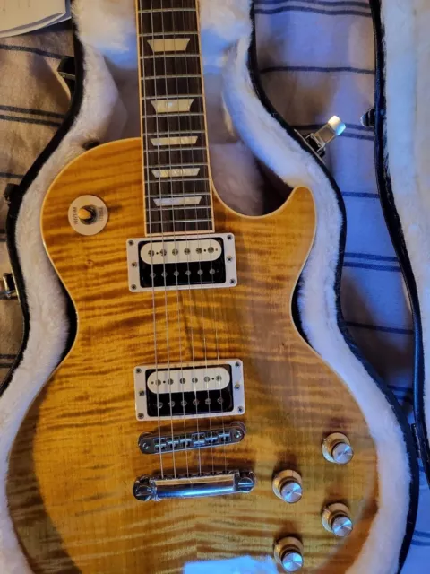 Pre-owned Gibson AFD Slash Les Paul from 2010, mint condition, nearly unplayed.