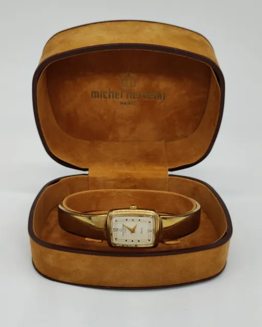 Montre Michel Herbelin femme bracelet semi-rigide en métal doré modèle 7855