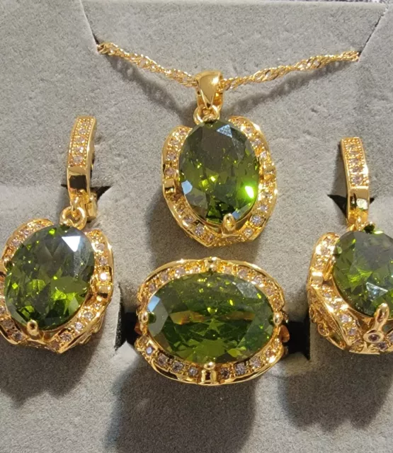 Gorgeous matching necklace, earrings, and ring set with simulated peridot.