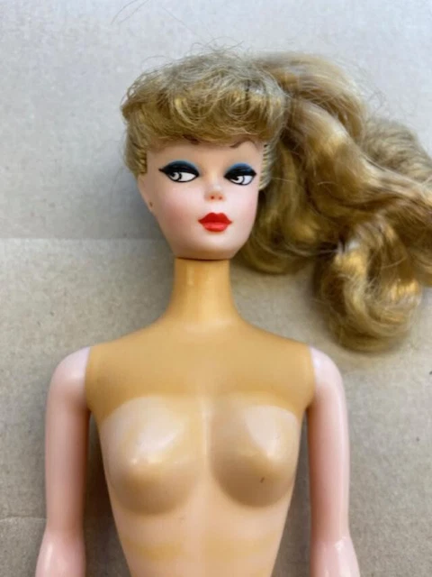 1958 1993 Reproduction Blonde Hair Ponytail Barbie Doll with white eyes 1958 1993 Reproduction Blonde Hair Ponytail Barbie Doll with white eyes