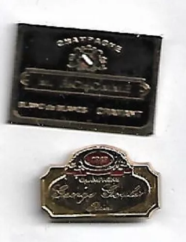 lot de 2 pin's boissons champagne : m. richomme, georges goulet reims