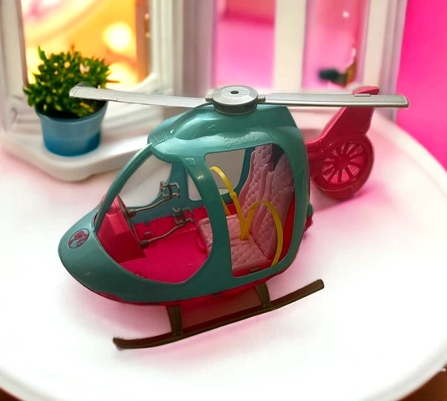 Barbie estate travel pink and 2025 blue helicopter with spinning rotors