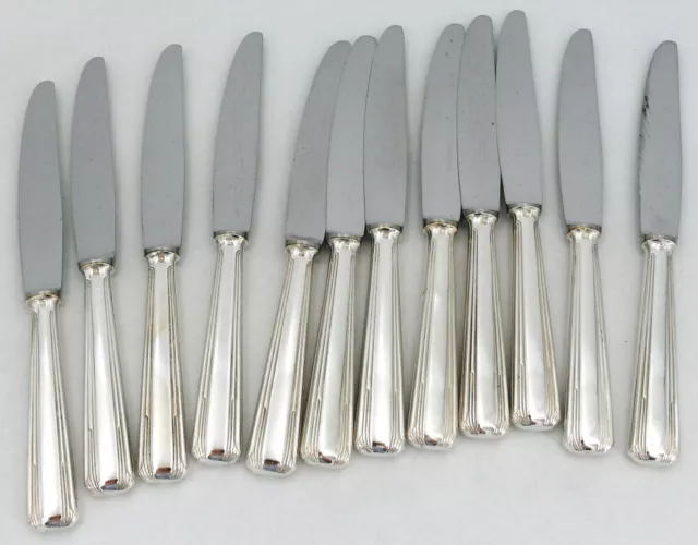 Ercuis modèle Islande, 12 couteaux à entremets/dessert/fromage, métal argenté.