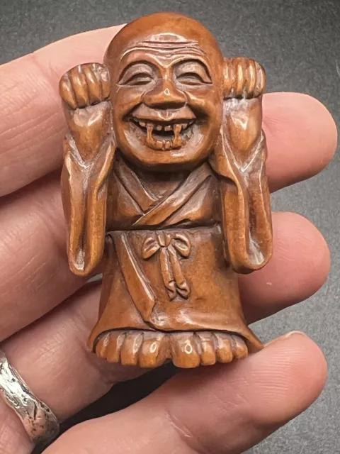 Netsuke-Buchsbaumfigur signiert Yokai-Mann mit Reißzähnen