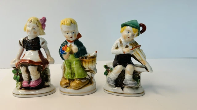 Made in Occupied Japan Boy w/Fiddle, girl on bench, boy w/ basket