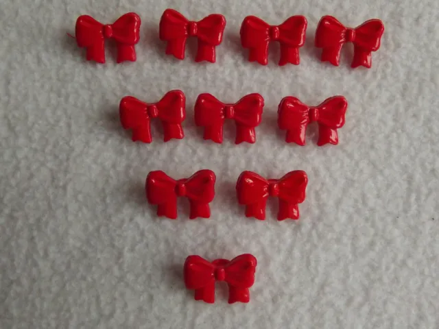 10 x RED BOW SHAPED BUTTONS 26L (approx 16mm x 10mm) ~ FASHION/CRAFT