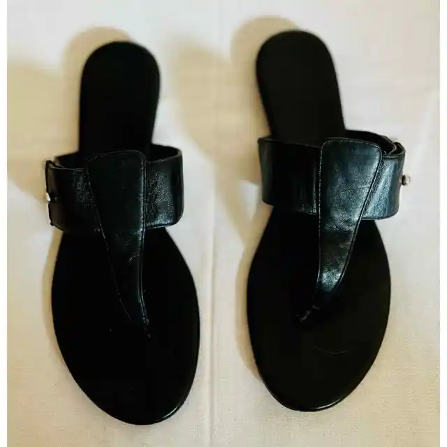 Calvin Klein women’s black thong sandals in size 8.5M