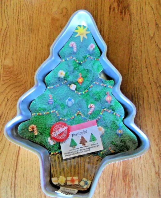 https://www.picclickimg.com/O3MAAOSw-i1i~lyz/1991-Christmas-Tree-Cake-Pan-Wilton-502-1107-Treeliteful.webp