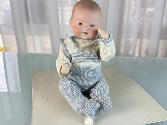 Poupée de collection tête porcelaine 37 cm. État voir photos
