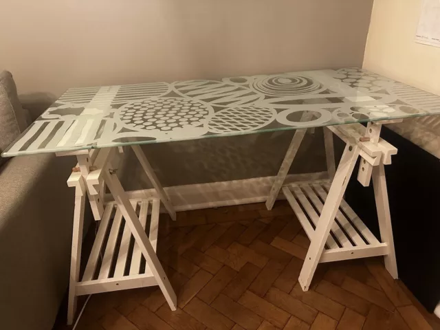 Glass top office desk with trestle legs