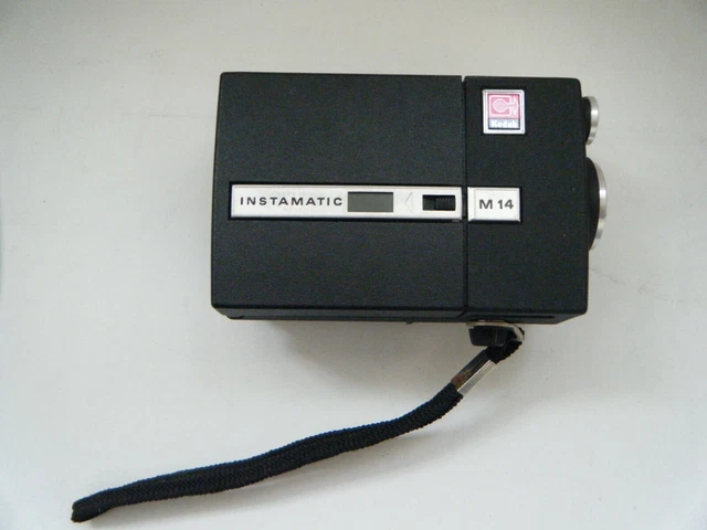 Minolta camera and a Kodak instamatic M14 in case