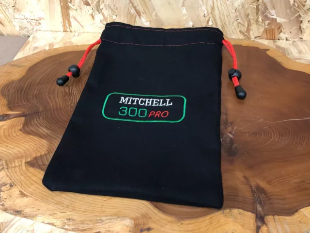 https://www.picclickimg.com/O88AAOSwj5VkJYWQ/MITCHELL-300-PRO-Reel-Pouch-Protect-Your-Precious.webp