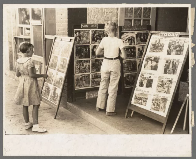 Photo 1930's Children looking at posters in front of movie, Saturday, Steele, MO