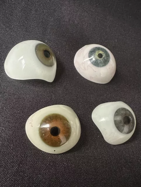 A set of 4 hand blown Glass prosthetic EYES, all different sizes & hand painted