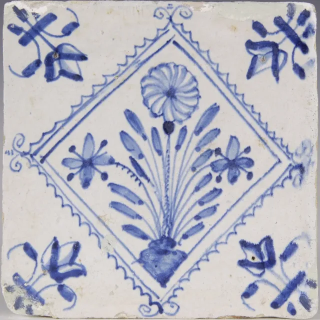 Nice Dutch Delft Blue tile, Carnation flower in blue diamond,first half 17th.ct.