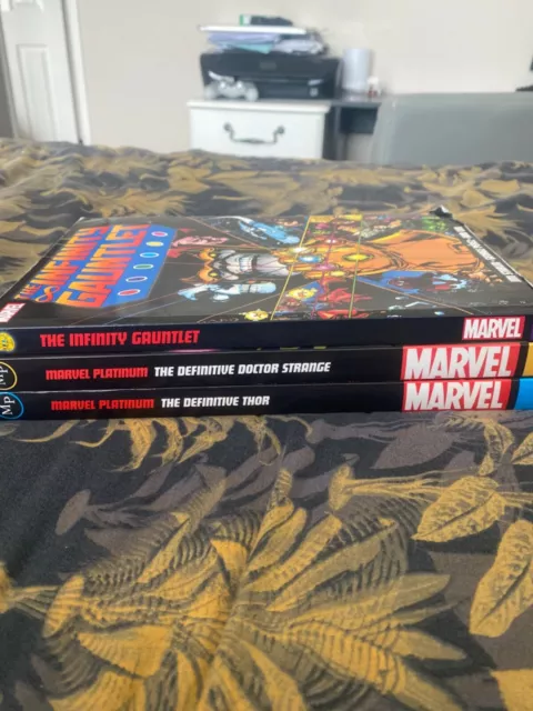 Marvel: The Infinity Gauntlet and Thor and doctor strange graphic novels