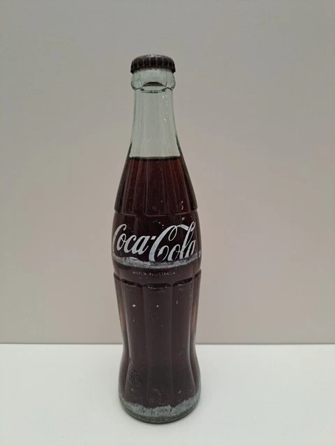 Bottiglia Di Coca Cola, Anni '80