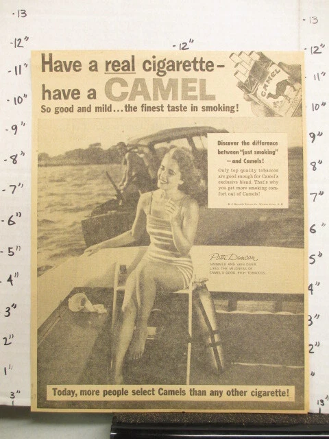 newspaper ad Camel Cigarette 1957 PATTI DUNCAN swimmer scuba diver boat swimsuit