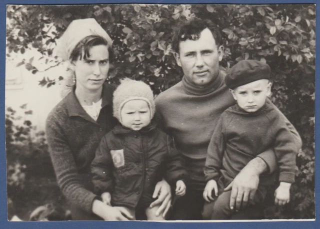 Vintage Photo. Soviet family. Beautiful Boy and girl with children.