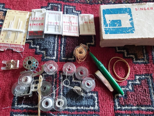 Agujas y carretes para máquina de coser Singer