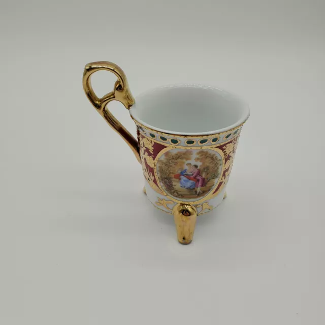 KPM Tripod Bone China Footed Demitasse Cup Courting Couple with Gold Trim