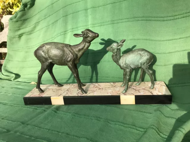 Art Deco spelter with aged bronze patina sculpture of two deer on a marble base