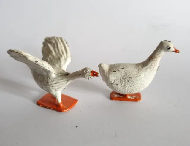 Two Lead Farmyard Geese In Very Good Condition