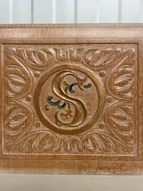 A Stunning Carved Panel in oak with the letter S