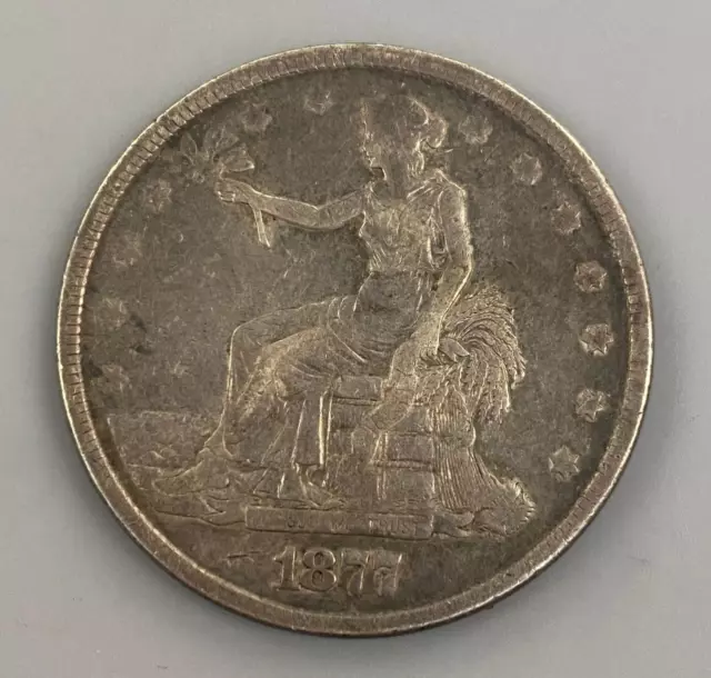 1877 P US 90% Silver Trade $1 cleaned L18562