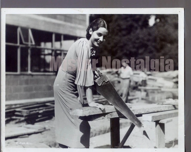 Vintage Photo 1936 Valerie Hobson sawing wood on set of The Secret Of Stamboul