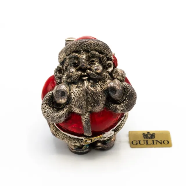 Silver and red enamelled Santa Claus objects L.22