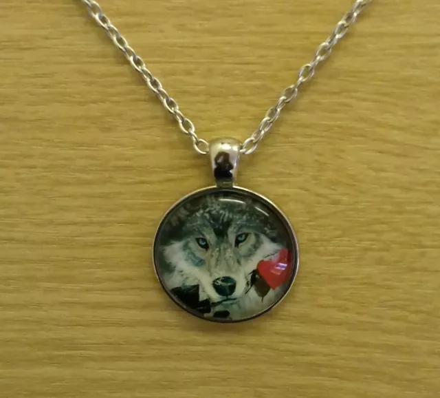 Silver Plated Round Glass Tango Wolf Pendant With Purple Pouch