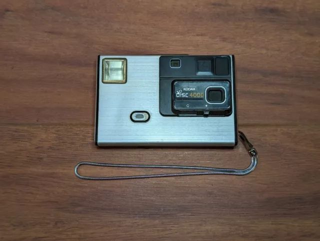 Vintage 1980s Silver Eastman Kodak Disc 4000 Camera Metal Strap Tested Clean