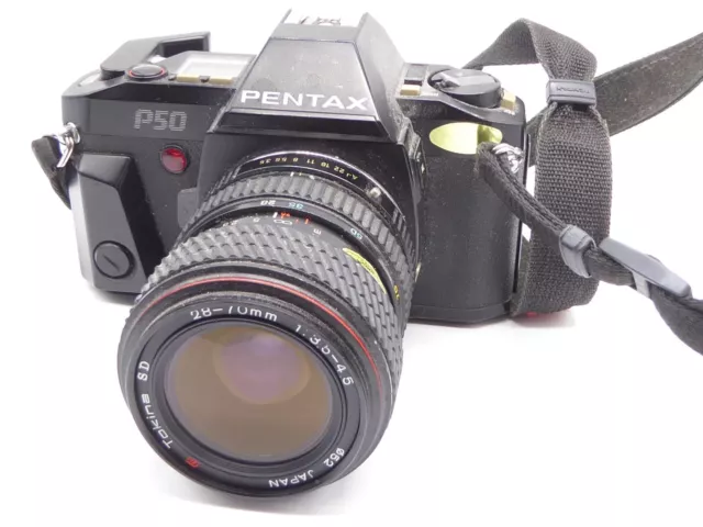 Pentax P50 35mm Film SLR Manual Camera with 28 70mm lens new battery also + cap