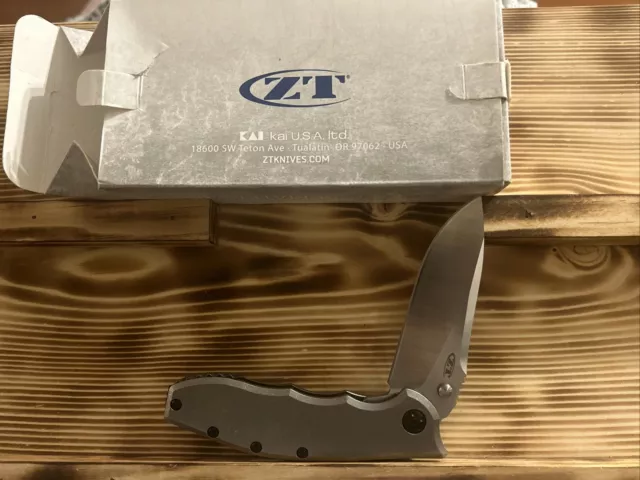 Zero Tolerance ZT 0562TI Hinderer Pocket Knife CPM-20CV Satin Blade Titanium